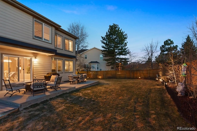 view of yard featuring a patio and a fenced backyard