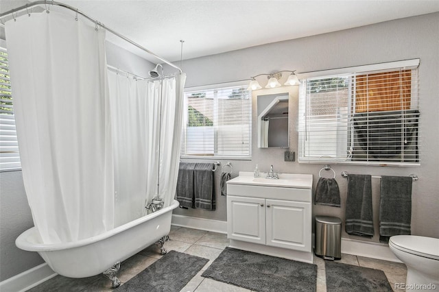 full bathroom with tile patterned flooring, vanity, toilet, and plus walk in shower