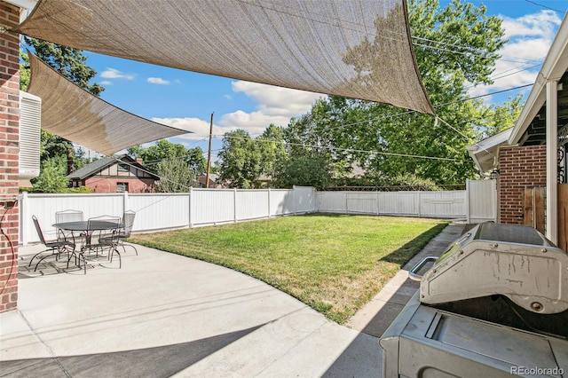 view of yard with a patio area