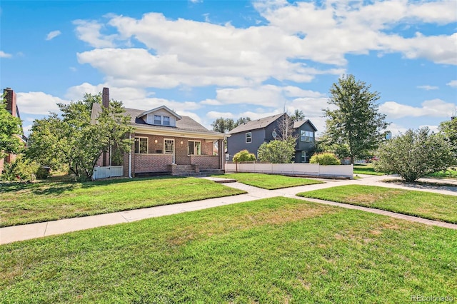 view of front facade with a front yard