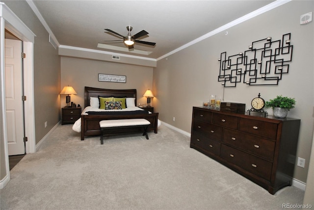 bedroom with light colored carpet, ornamental molding, and ceiling fan