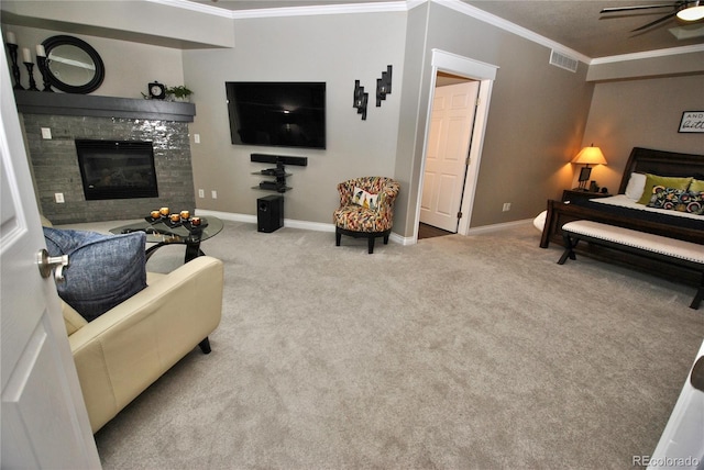 carpeted living room featuring ornamental molding and ceiling fan