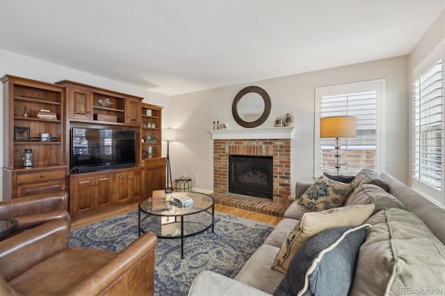 living room with a fireplace and hardwood / wood-style floors