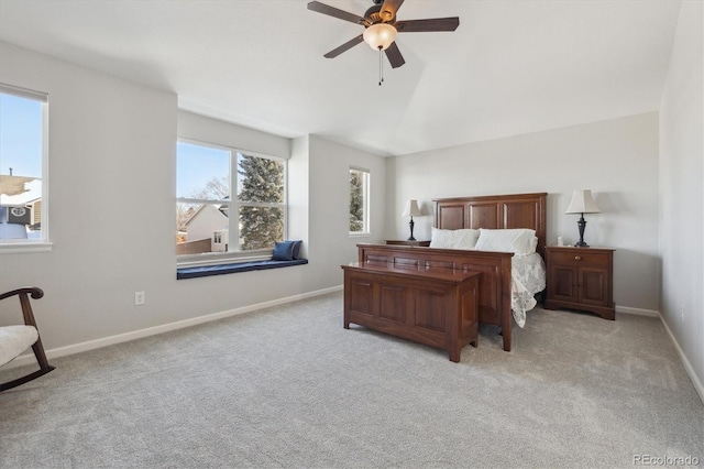 bedroom featuring ceiling fan and light colored carpet