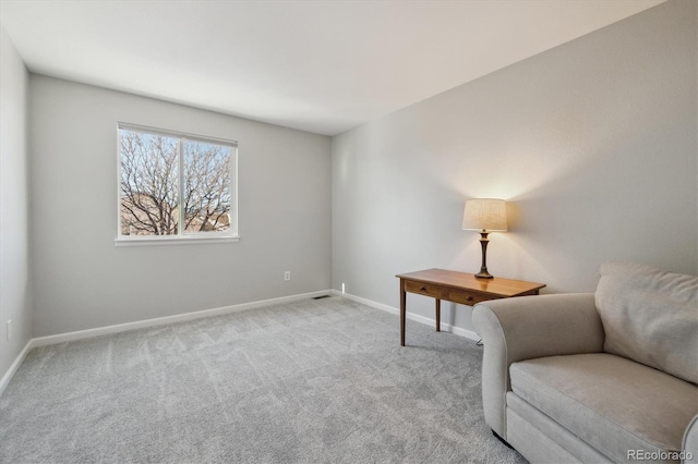 unfurnished room with light carpet