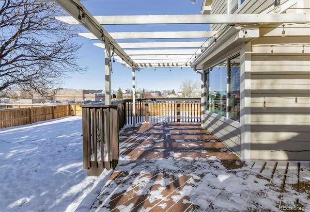 view of snow covered deck