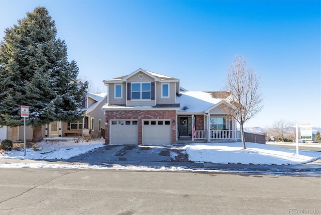 front of property with a porch and a garage