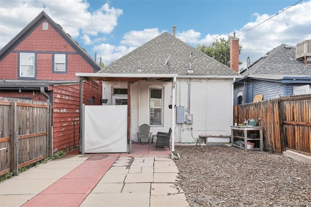 rear view of house featuring a patio area