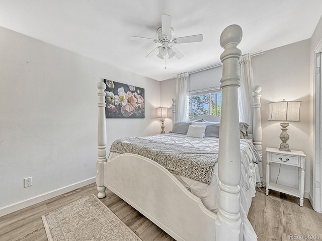 bedroom featuring ceiling fan and light hardwood / wood-style flooring