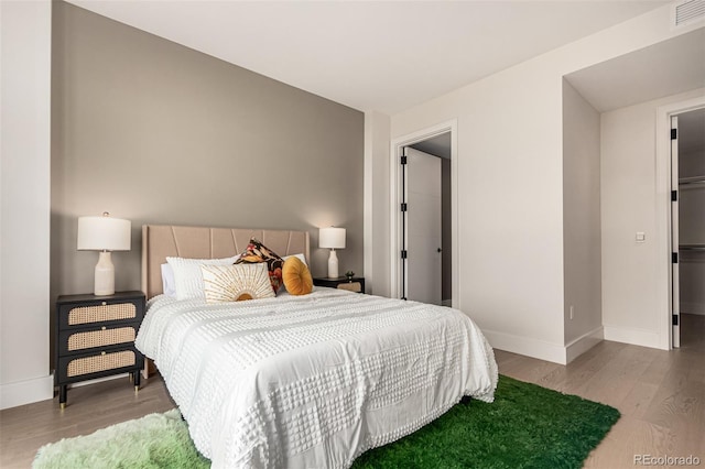 bedroom featuring light hardwood / wood-style flooring