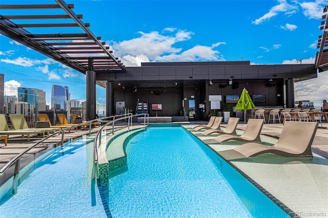 view of swimming pool featuring a patio