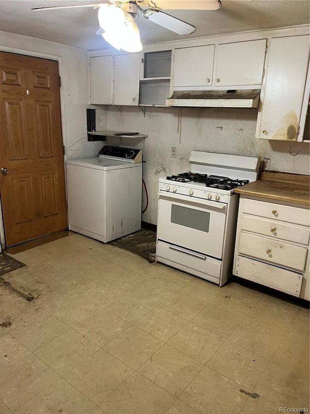 kitchen with ceiling fan, white cabinetry, washer / dryer, and white range with gas cooktop