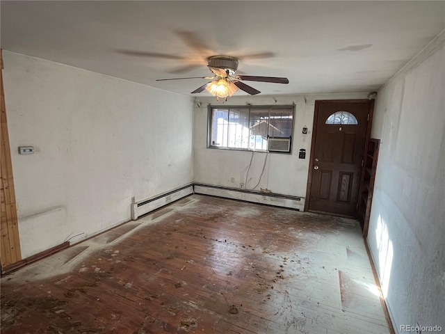 entrance foyer featuring ceiling fan and a baseboard heating unit