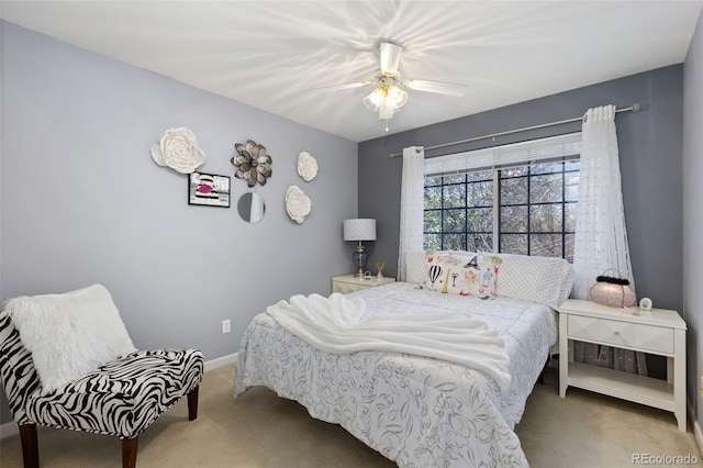 bedroom with baseboards, ceiling fan, and carpet