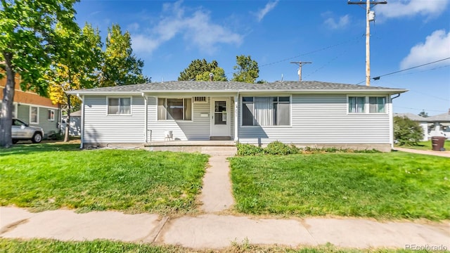 view of front of home featuring a front yard