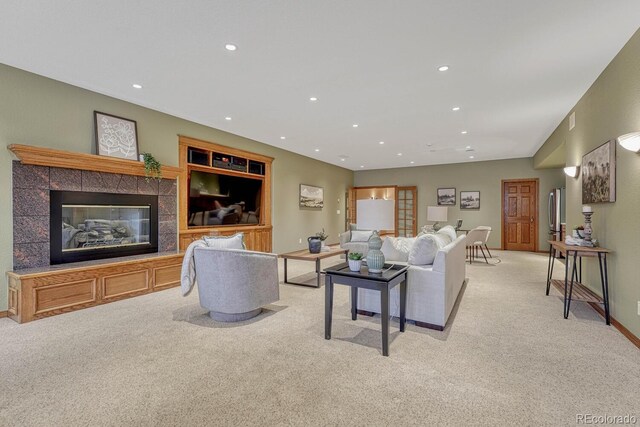 14581 E Oberlin Pl, Aurora, CO 80014 - living area featuring light colored carpet, recessed lighting, baseboards, and a fireplace