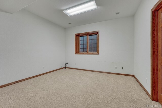 14581 E Oberlin Pl, Aurora, CO 80014 - unfurnished room with light colored carpet and baseboards