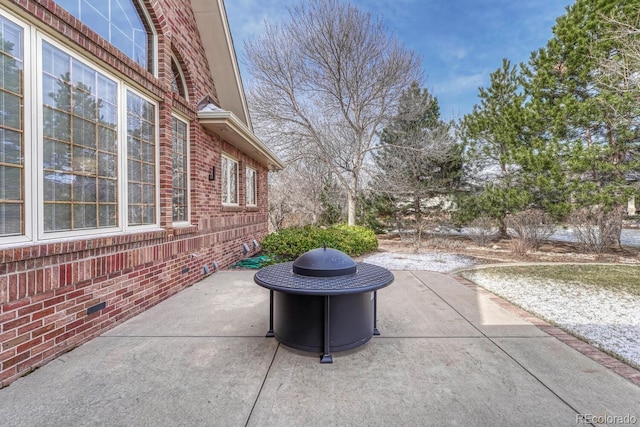 14581 E Oberlin Pl, Aurora, CO 80014 - view of patio / terrace with a fire pit