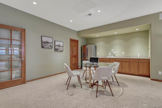 14581 E Oberlin Pl, Aurora, CO 80014 - dining area with light carpet, recessed lighting, and baseboards