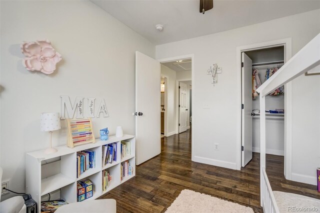 9643 Yukon Way, Colorado Springs, CO 80925 - bedroom with wood finished floors, attic access, a spacious closet, and a closet