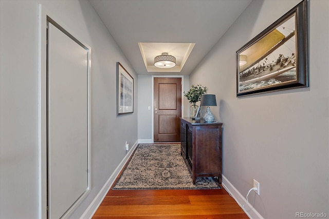 entryway with hardwood / wood-style flooring