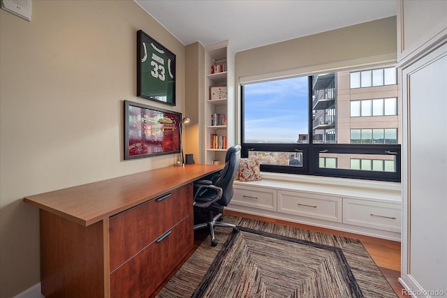 office space with dark hardwood / wood-style floors