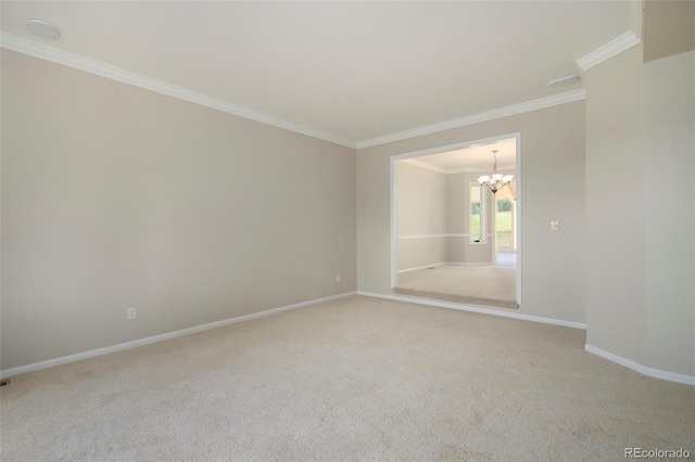 empty room with crown molding, light carpet, and a notable chandelier