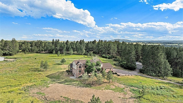 birds eye view of property featuring a rural view