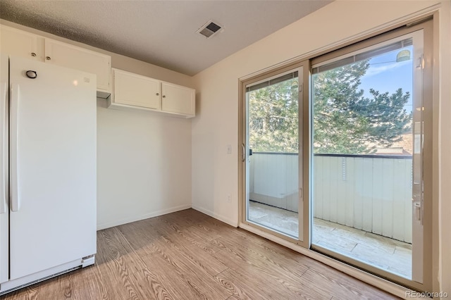 entryway featuring light hardwood / wood-style floors