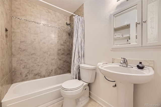 bathroom with tile patterned flooring, shower / bathtub combination with curtain, and toilet