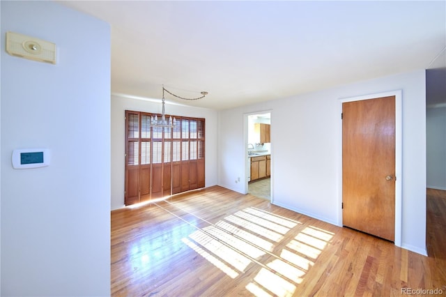 6579 S Lincoln St, Centennial, CO 80121 - interior space featuring a chandelier and light wood-style flooring