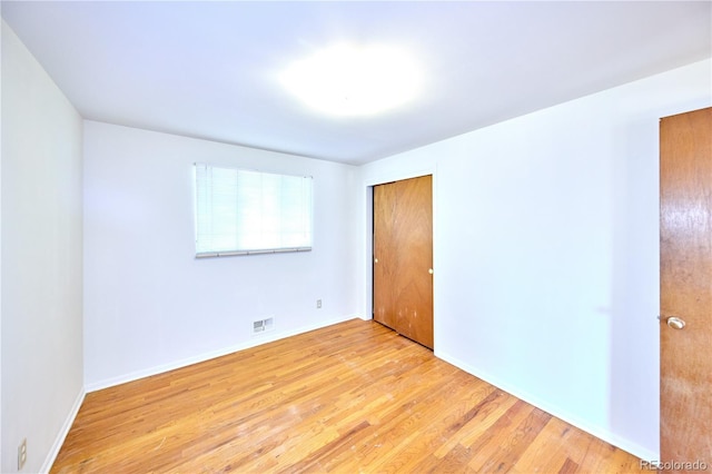 6579 S Lincoln St, Centennial, CO 80121 - unfurnished bedroom featuring wood finished floors and baseboards