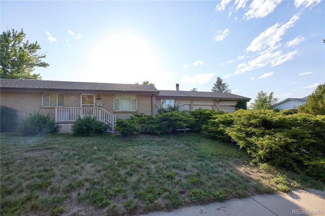 6579 S Lincoln St, Centennial, CO 80121 - single story home with brick siding and a front yard