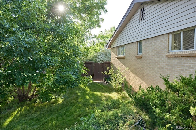 6579 S Lincoln St, Centennial, CO 80121 - view of side of property featuring brick siding