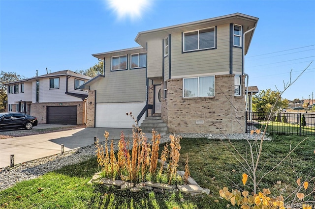 view of front facade featuring an attached garage, fence, concrete driveway, and brick siding