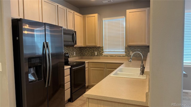1254 Carlyle Park Cir, Highlands Ranch, CO 80129 - kitchen featuring stainless steel fridge with ice dispenser, black electric range, backsplash, and light countertops