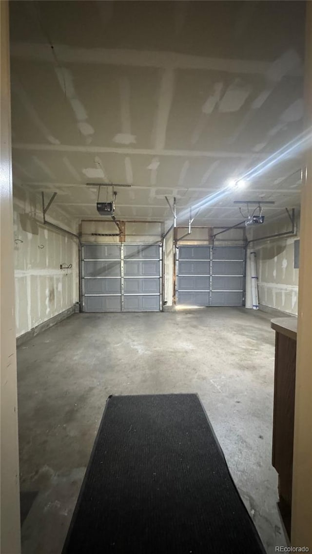 1254 Carlyle Park Cir, Highlands Ranch, CO 80129 - garage featuring a garage door opener