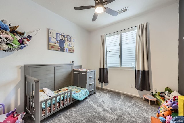 bedroom featuring carpet floors, visible vents, and a ceiling fan