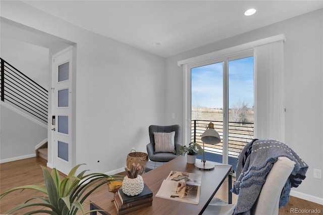 office space with recessed lighting, baseboards, and wood finished floors