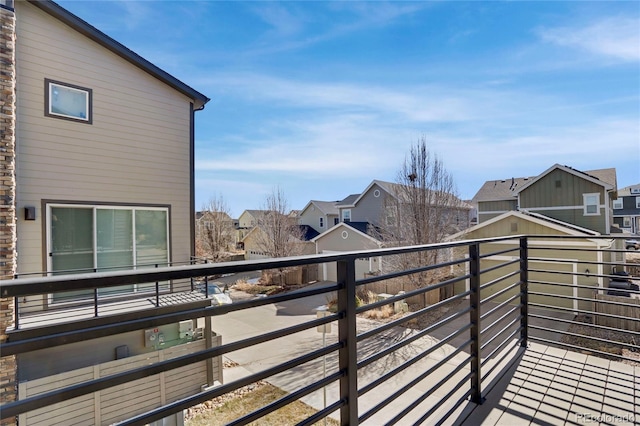 balcony featuring a residential view