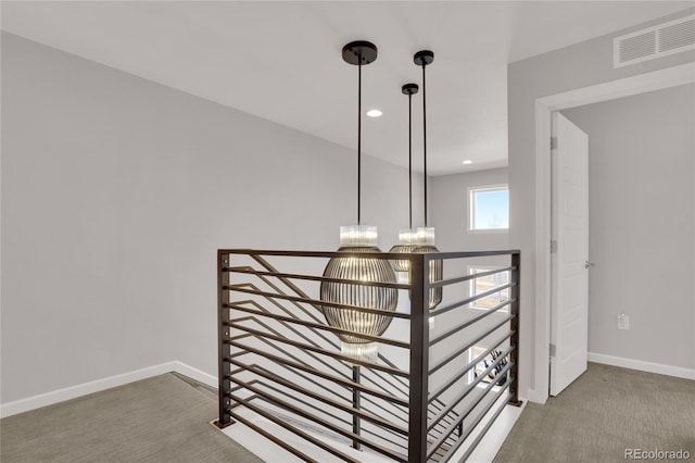 room details featuring carpet, recessed lighting, visible vents, a chandelier, and baseboards