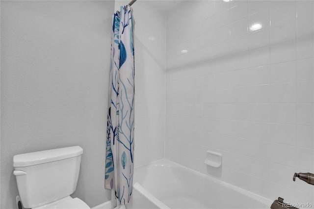 full bathroom featuring shower / bath combination with curtain and toilet