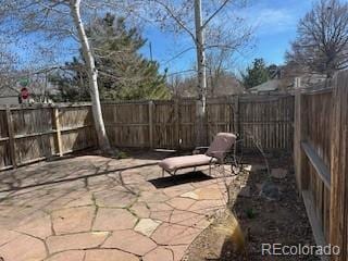 751 Eudora St, Denver, CO 80220 - view of patio with a fenced backyard