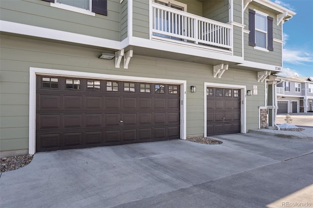 garage featuring driveway