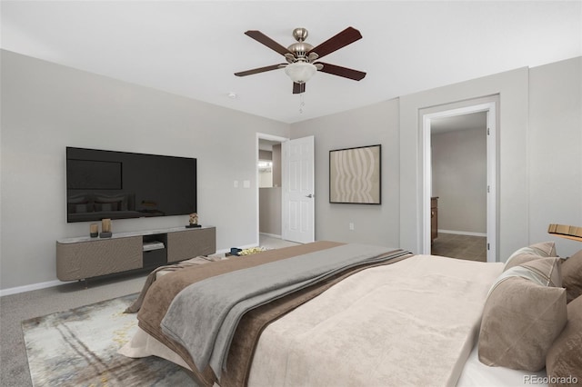 bedroom featuring ceiling fan, carpet flooring, and baseboards