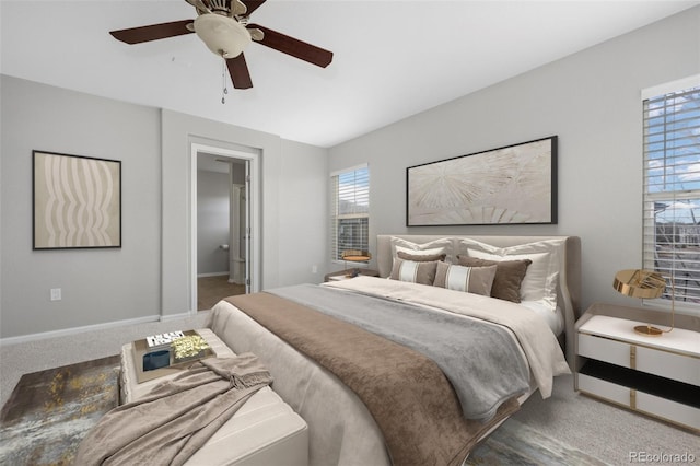 bedroom featuring carpet flooring, a ceiling fan, and baseboards