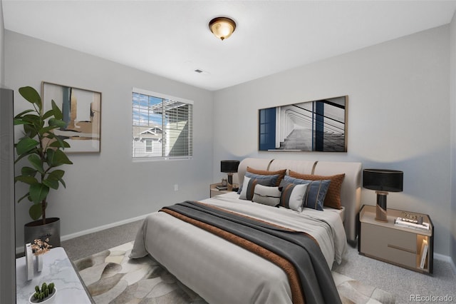 carpeted bedroom featuring baseboards