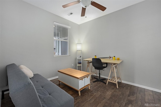 home office featuring ceiling fan, wood finished floors, visible vents, and baseboards