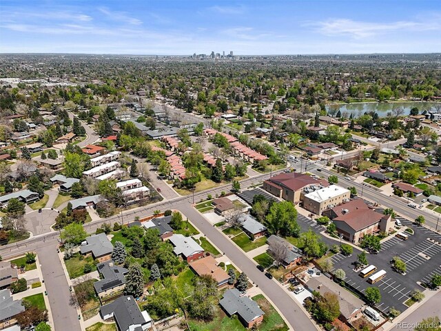 2704 S Ames Way, Denver, CO 80227 - aerial view of property and surrounding area with a large body of water and nearby suburban area