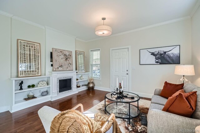 5101 Meade St, Denver, CO 80221 - living area with baseboards, ornamental molding, and wood finished floors